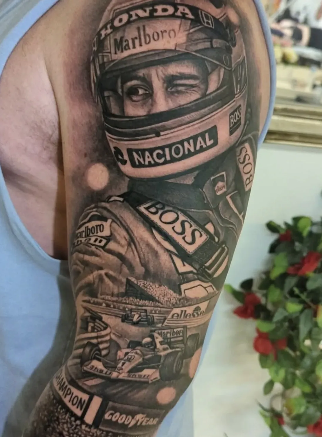 Realistic portrait of a racing driver with helmet and racing elements